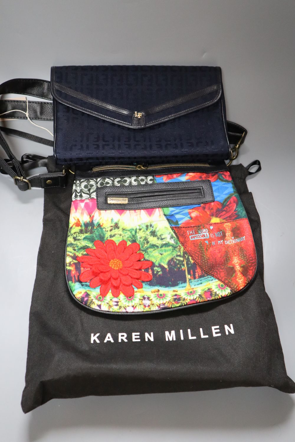 A Louis Feraud handbag, Karen Millen handbag and Desigual handbag